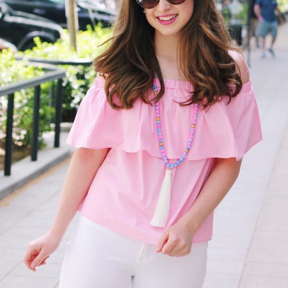 Pink ruffle off the shoulder blouse